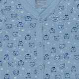 Light blue baby onesie with blue bear faces, paw prints, white hearts, and button front