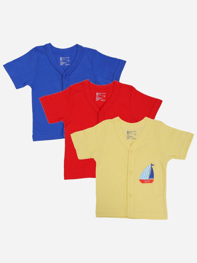 Set of three short-sleeve baby vests in blue, red, and yellow with a sailboat print.