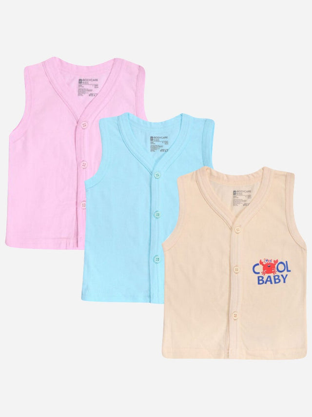 Set of three sleeveless baby vests in pink, blue, and beige with button front, soft cotton.