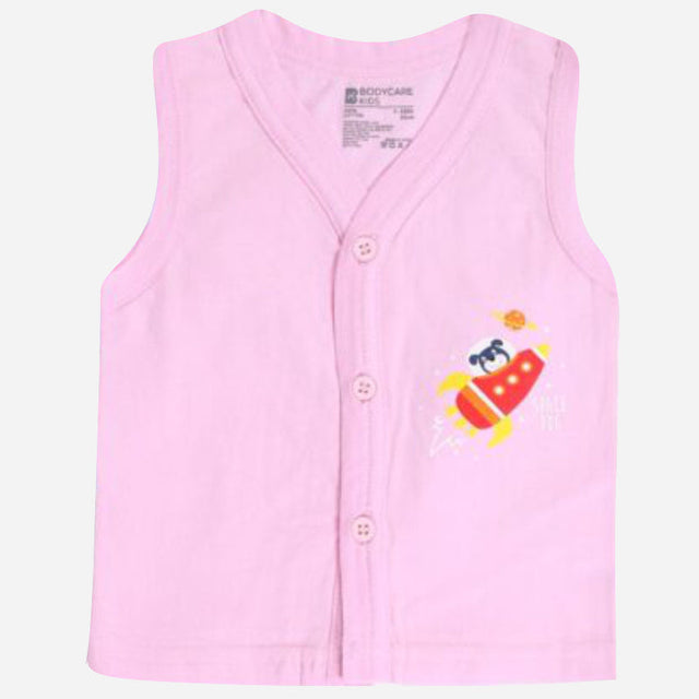 Pink sleeveless baby vest with buttons and cartoon rocket print on front