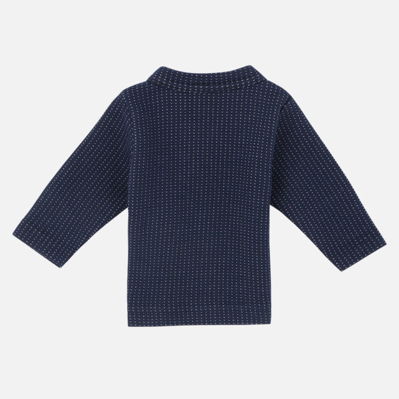 Navy blue kids thermal top with long sleeves and subtle dotted pattern, back view