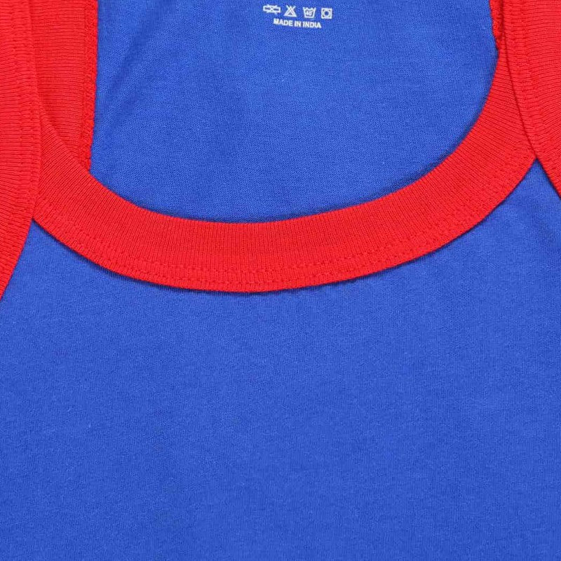 Closeup of blue kids innerwear shirt with red neckline and soft cotton fabric