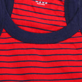 Red kids innerwear tank top with navy blue stripes and neckline, close-up view