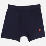 Navy blue boys boxer brief with front pouch and small orange logo on left leg