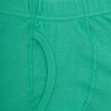 Close-up of green cotton kids innerwear with visible seams and soft fabric texture