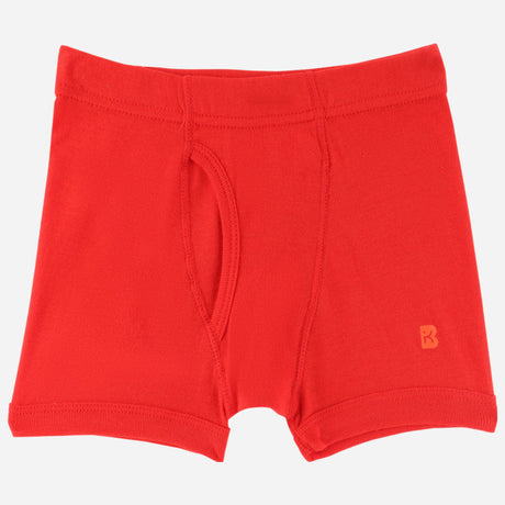 Red boys' cotton innerwear trunk with front pouch and logo on leg, kids underwear