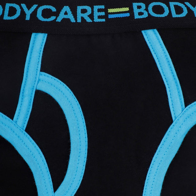 Close-up of black kids innerwear with blue stitching and elastic waistband detail