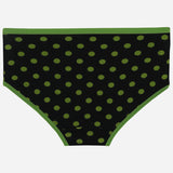 Black kids' underwear with green polka dots and green trim, front view, on white background