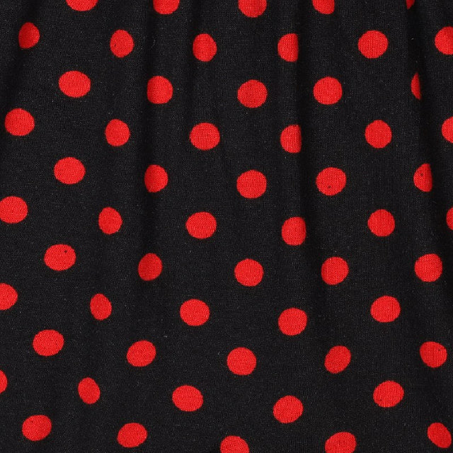 Black fabric with bright red polka dots, kids apparel textile pattern