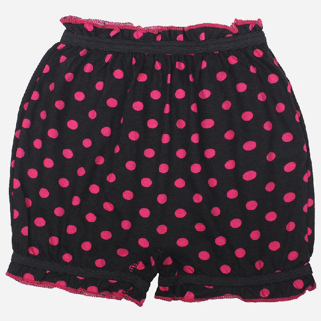 Black kids' innerwear shorts with pink polka dots and ruffled elastic waistband.