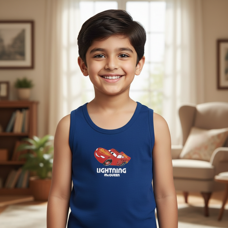 Smiling boy in blue Lightning McQueen sleeveless vest, kids innerwear, cozy living room
